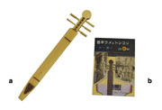 a 楽器 トンコリ,b てびき『西平ウメとトンコリ』